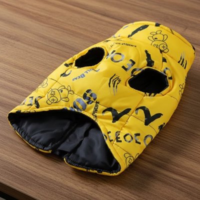 Yellow waterproof dog coat UK — quilted lining and leg openings detail view